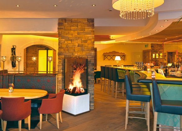 Beschließen Sie den Abend bei romantischer Zweisamkeit an der Hotelbar