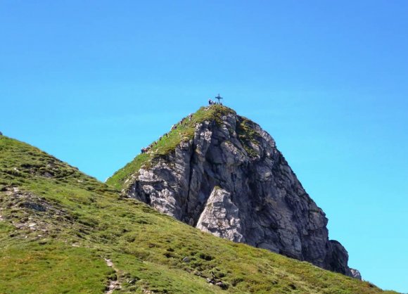 Gemeinsame Urlaubserlebnisse beim Erklimmen von Gipfeln